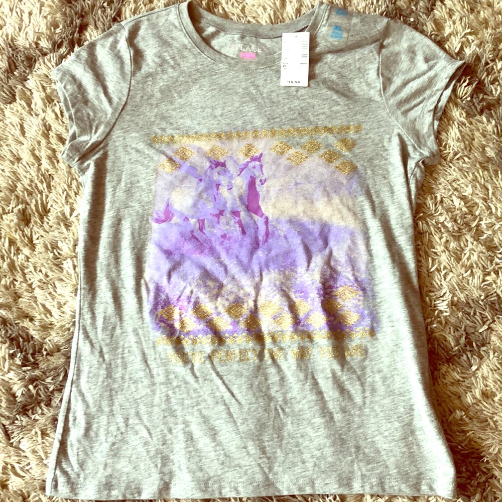 A  sparkly unicorn shirt sleeve shirt